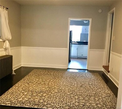 Dining Room ~ plenty of room ~ Wainscoting ~ Hardw
