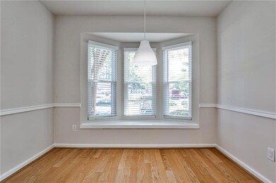 Eat-in kitchen with nice windows and lots of natural light.