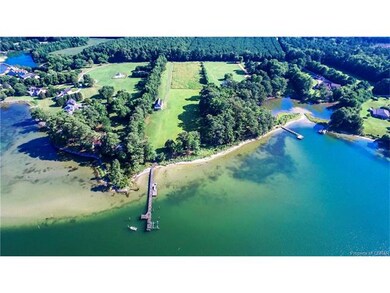 Aerial of waterfront and property.