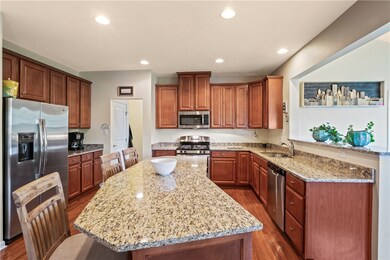 Gorgeous kitchen with granite countertops and plen