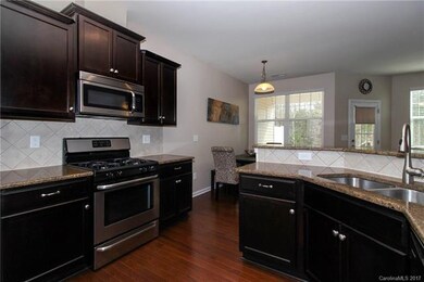 Kitchen with stainless appliances and granite coun