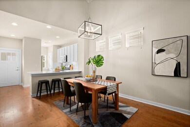 Dining area with hardwood / wood-style flooring, 