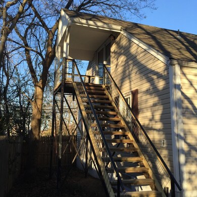 STAIR WELL TO UPSTAIRS APARTMENT