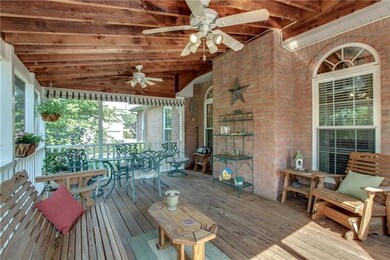 Many wonderful evenings have been spent on this spacious 20x14 Screened in porch.  Vaulted ceiling, ceiling fans, and the irrigation system provides water to your plants!