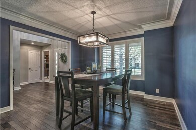 Dining Room with Crown Molding and Plantation Shut
