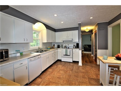 Kitchen with an Abundance of Cabinetry & Counter S