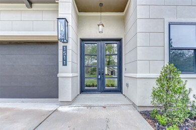 A gorgeous landscaped pathway
leads to two elegan