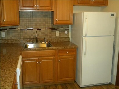 Nice tile backsplash and a dishwasher to