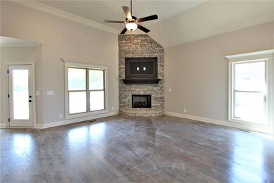 Great Room With Custom Stone Gas Fireplace