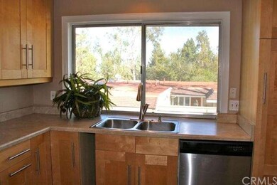 Large window at sink for natural lighting