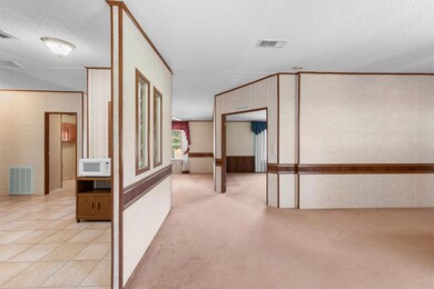 Entryway - Kitchen on the left, living room on the right - bonus room ahead