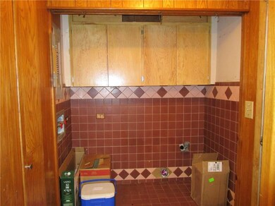 Laundry area, conveniently located near the kitchen.