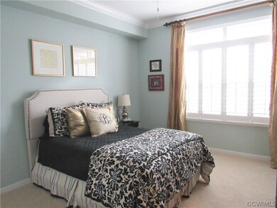 1st floor bedroom w/ double window w/ plantation s