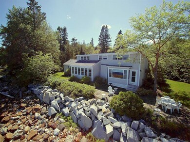 View from the shore with stone patio