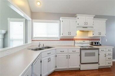 Cooks kitchen w plenty of cabinets.