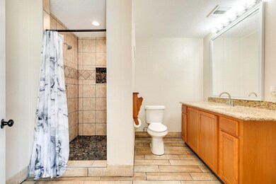 FULL BATH IN SHOP CLIMATE CONTROLED