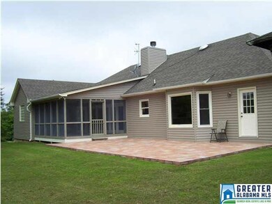 Back of house showing patio