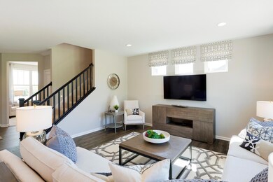 the gathering room is great for entertaining, as shown in our former model in Lakeville