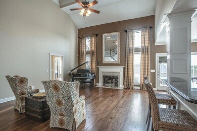 You'll catch the gorgeous sunsets from this spacious family room open to kitchen.