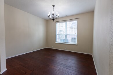Elegant dining room featuring rich hardwood floors