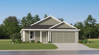 View of front of house featuring an attached gara