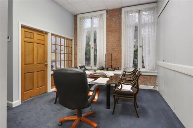 Conference room overlooking Baronne Street, origin