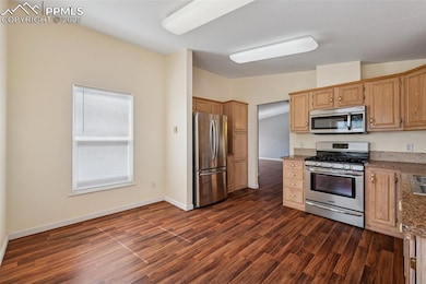 Oak cabinets, Gas Range, and French door fridge