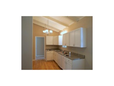 Kitchen with new upper cabinets, enamel, counterto