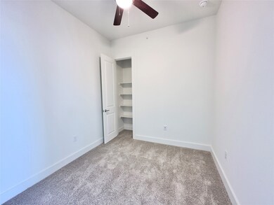 Study with closet off of living room