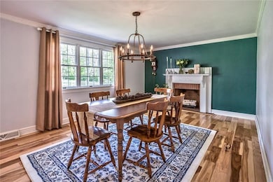 Dining Room Hardwood Floors & Fireplace