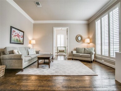 This living area offers plenty of light and charm.