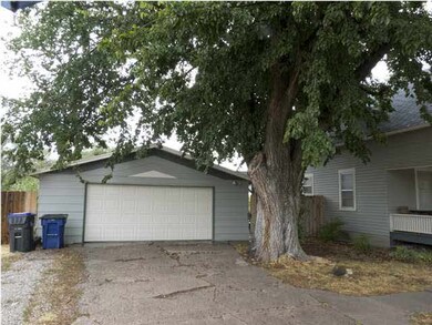 Over sized 2-car garage with opener