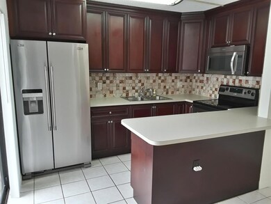 1710 Forest Lakes Cir unit B, West Palm Beach, FL 33406 - photo 2