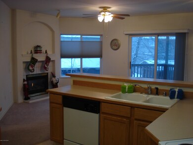 Kitchen looking out into Living Room