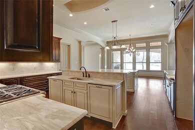 Kitchen appliances include two dishwashers, double