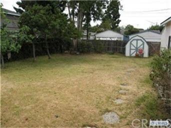 Large Backyard With Detached Garage And Alley Acce