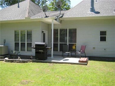 Backyard. Porch at rear of house with hookup for g