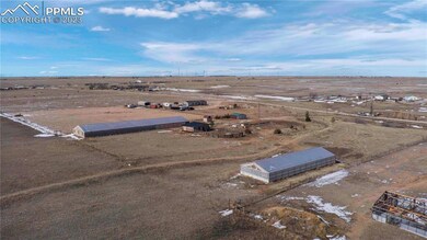 BIRD EYE VIEWS LOOKING NORTHWEST- GREEN HOUSES ON 