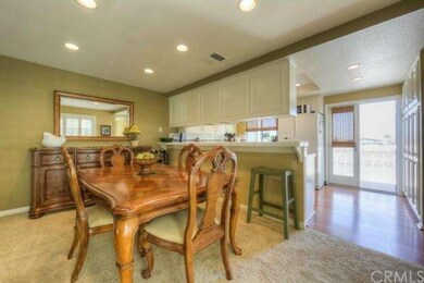 Dinning area opens to kitchen and a large deck wit