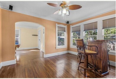 Dining space with ceiling fan, dark hardwood / woo