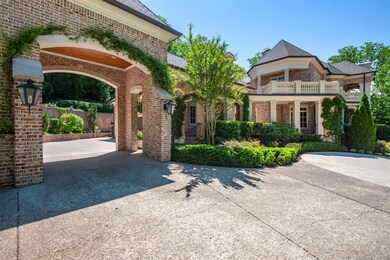 Porte-cochere adds elegance to the exterior.