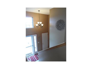 Foyer. 2 story foyer with transom window above the