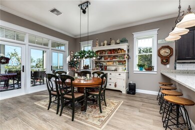 Dining area looking out to second floor porch and