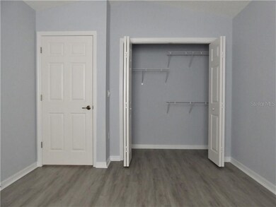 Bedroom 2 with a generous closet.