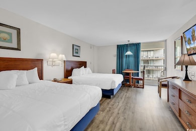 Bedroom featuring light wood-style floors
