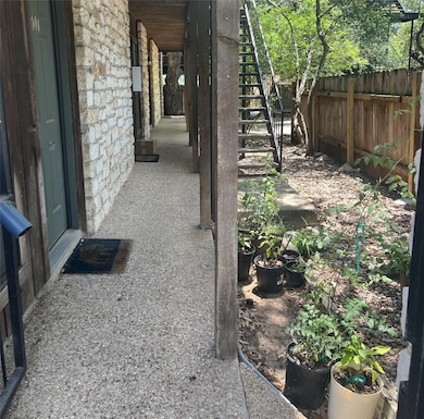 View of yard featuring stairway