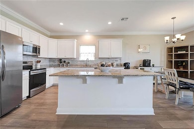 Kitchen with Island, Stainless Steel Appliance's a