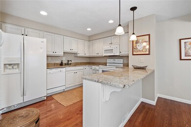 Granite Counters, Hardwood Floors, Gleaming White