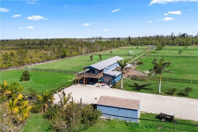 Beyond the barn, the property is equipped with a H