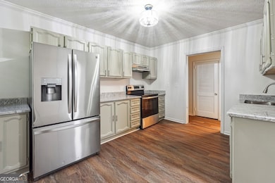 Brand new quartz countertops in each kitchen along